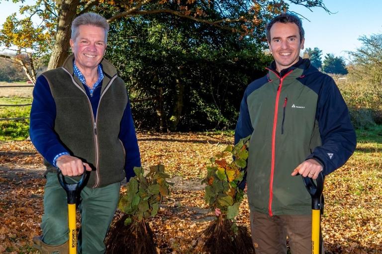 Cllr Peter Schwier and Essex Forest Initiative lead Tom Moat plant trees as part of the award-winning campaign.